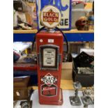 A VINTAGE STYLE 'BLACK GOLD' WOODEN PETROL PUMP KEY CABINET