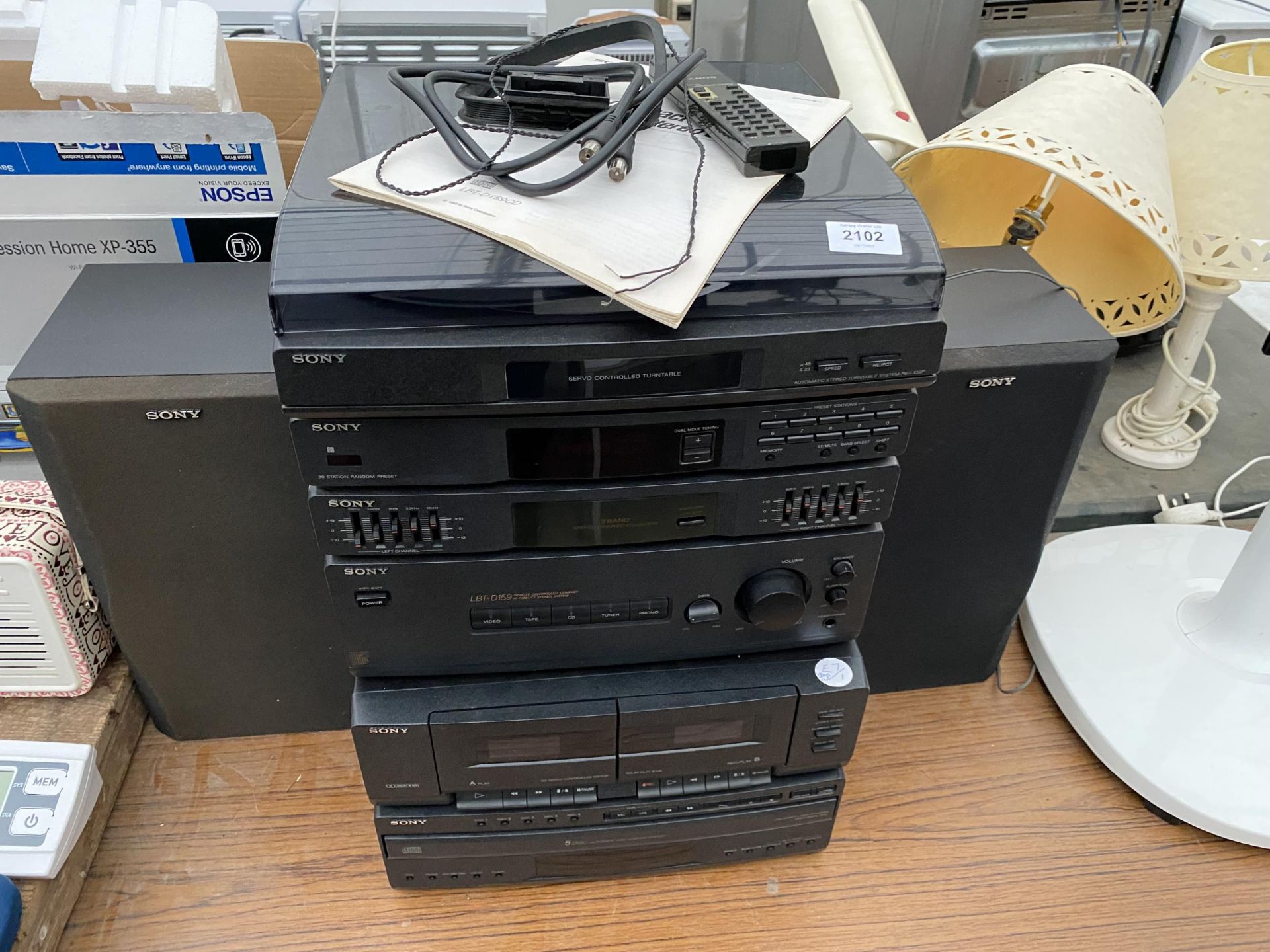 A SONY STEREO SYSTEM TO INCLUDE TURNTABLE, TAPE DECK AND TWO SPEAKERS ETC