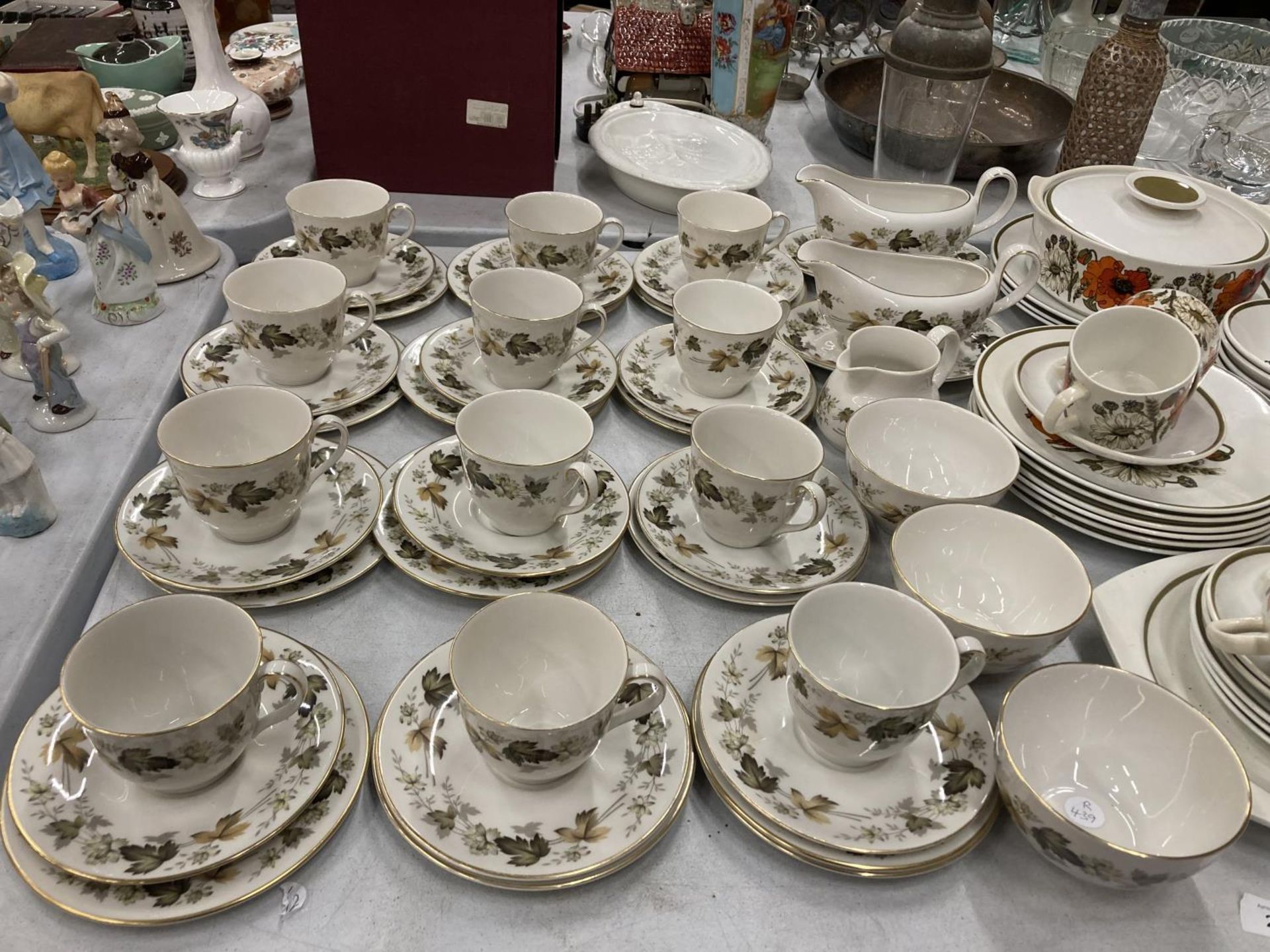 A LARGE QUANTITY OF ROYAL DOULTON 'LARCHMONT' TRIOS PLUS SAUCE BOATS AND SAUCERS, A CREAM JUG AND