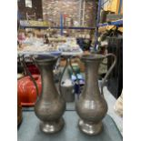 A PAIR OF PEWTER ARTS AND CRAFTS STYLE TWIN HANDLE VASES HEIGHT 28CM