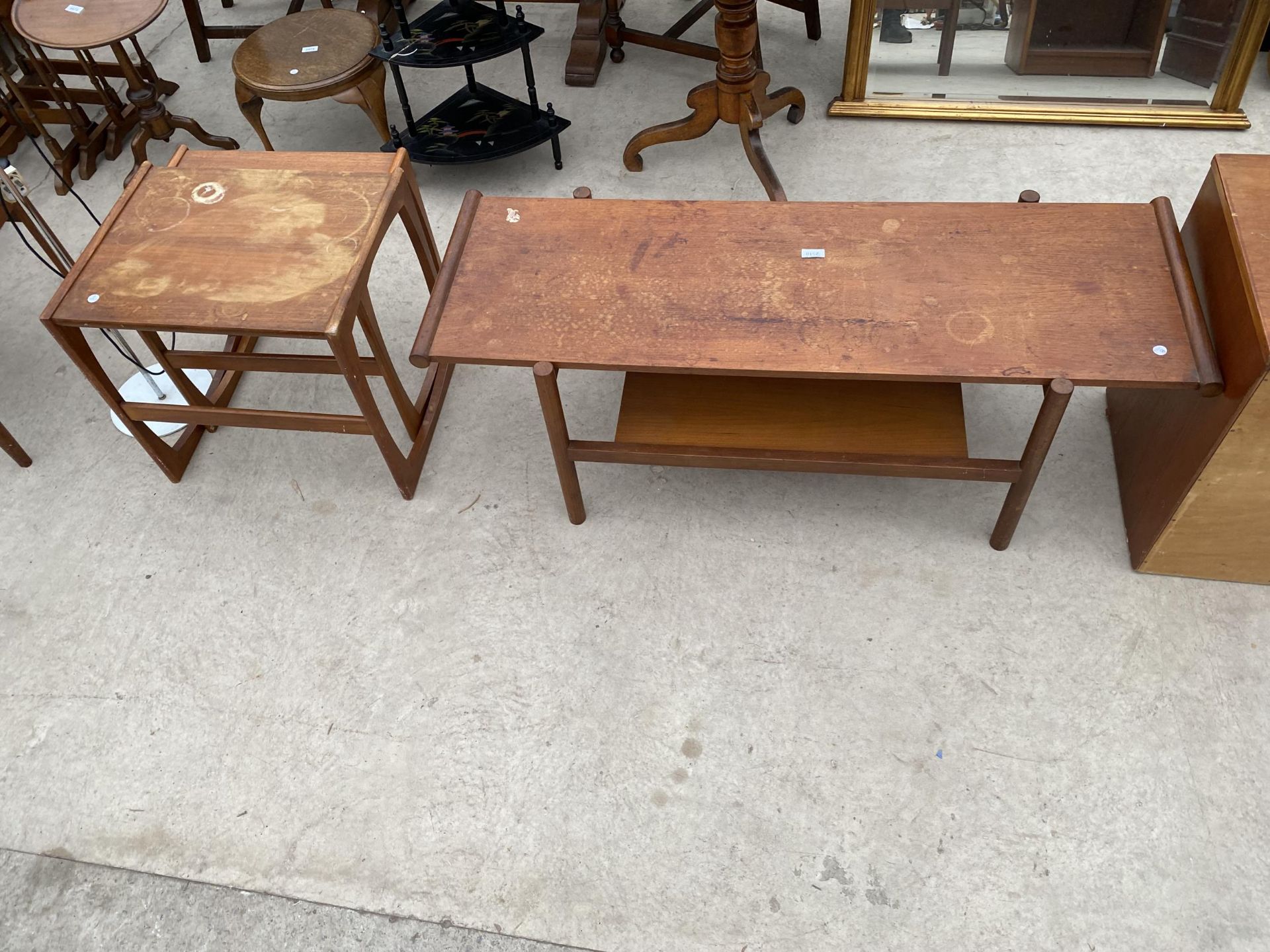 A RETRO TEAK TWO TIER COFFEE TABLE, 50X17" AND A NEST OF TWO TABLES