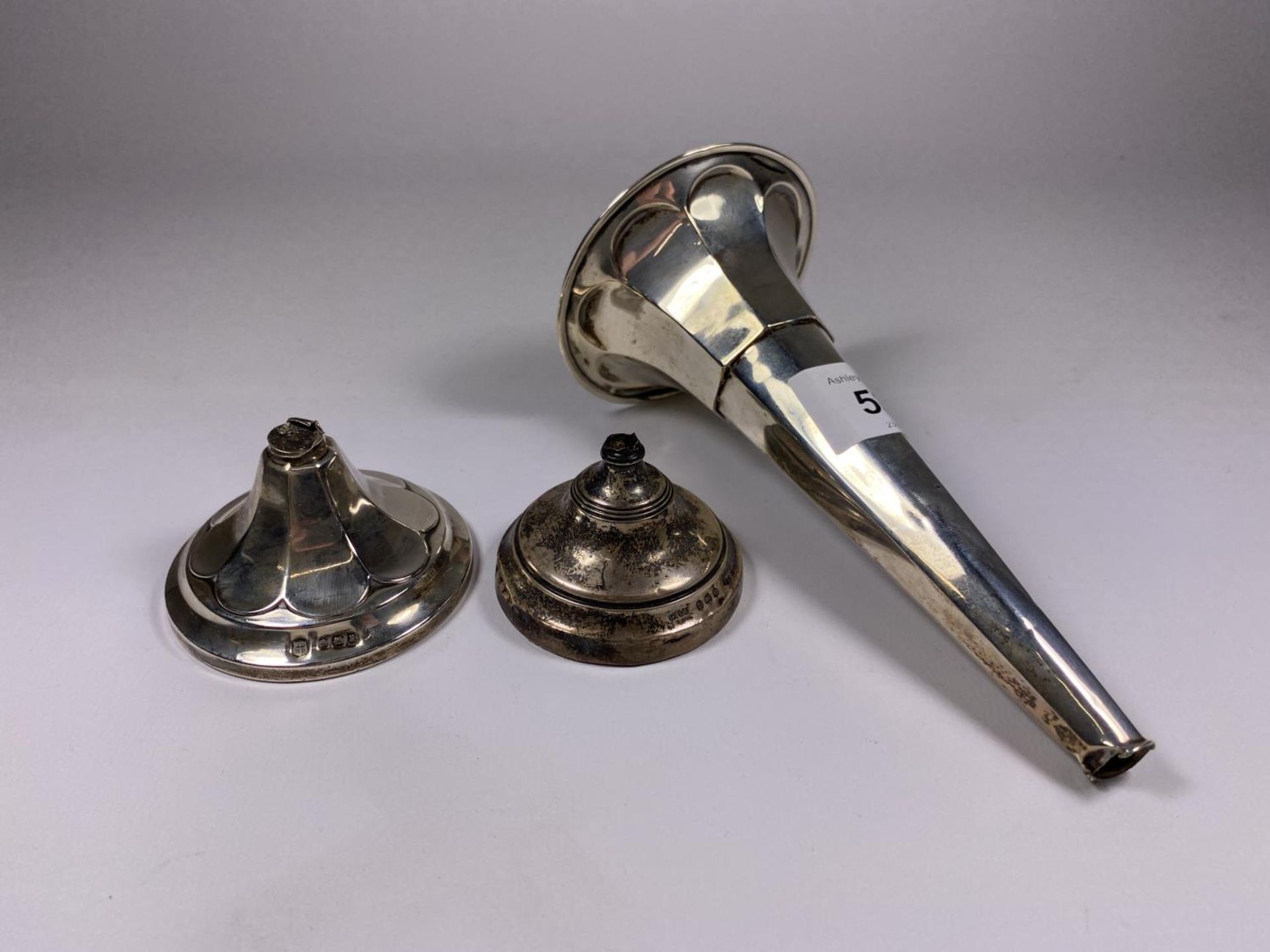 TWO SCRAP SILVER ITEMS, BUD VASE (A/F) AND FURTHER WEIGHTED SILVER BASE