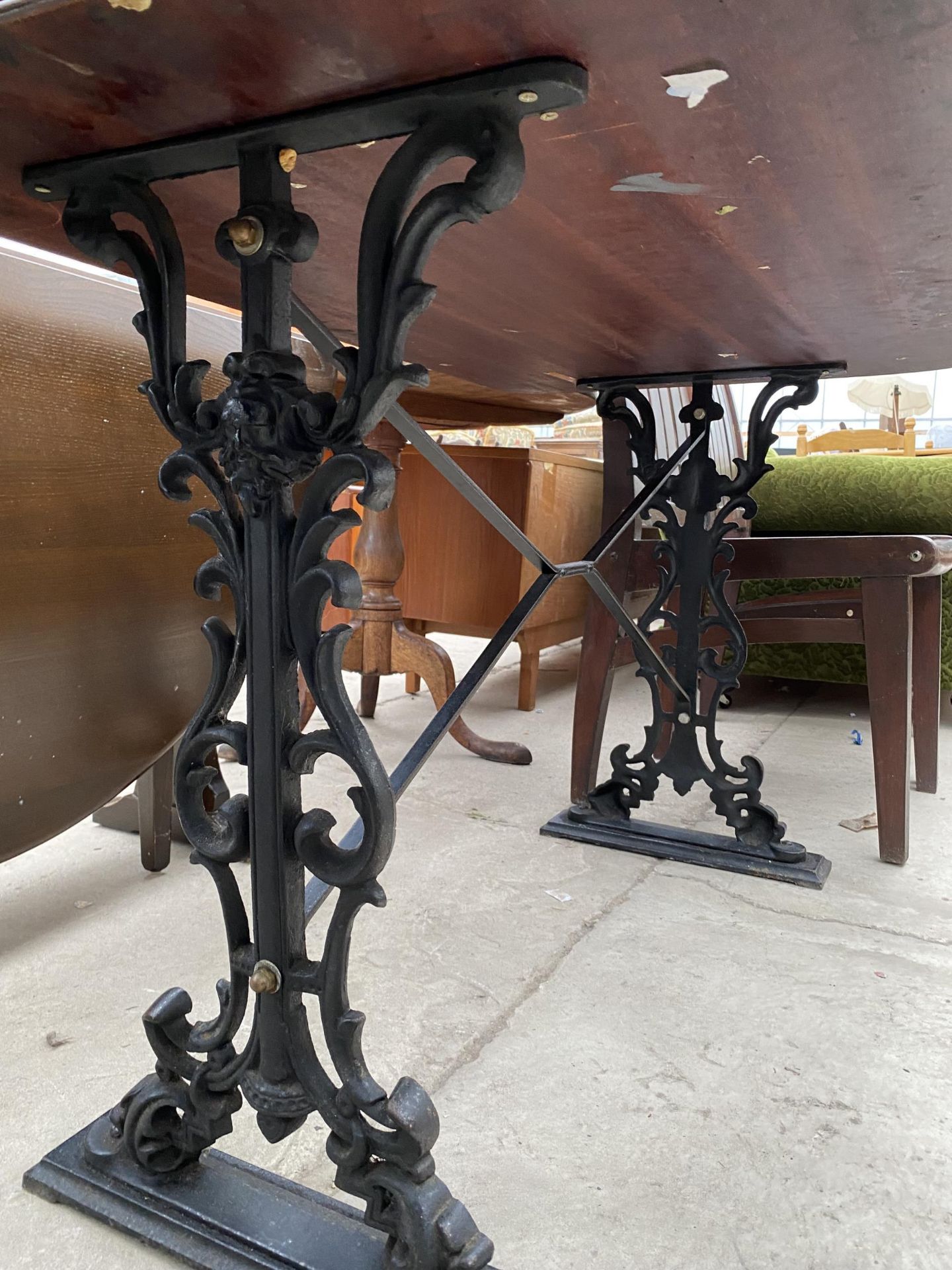 A PUB TABLE ON CAST IRON BASE, 48X27" - Image 3 of 4