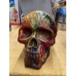 A COLLECTABLE RESIN MODEL OF A SKULL