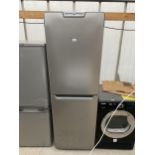 A SILVE HOTPOINT UPRIGHT FRIDGE FREEZER