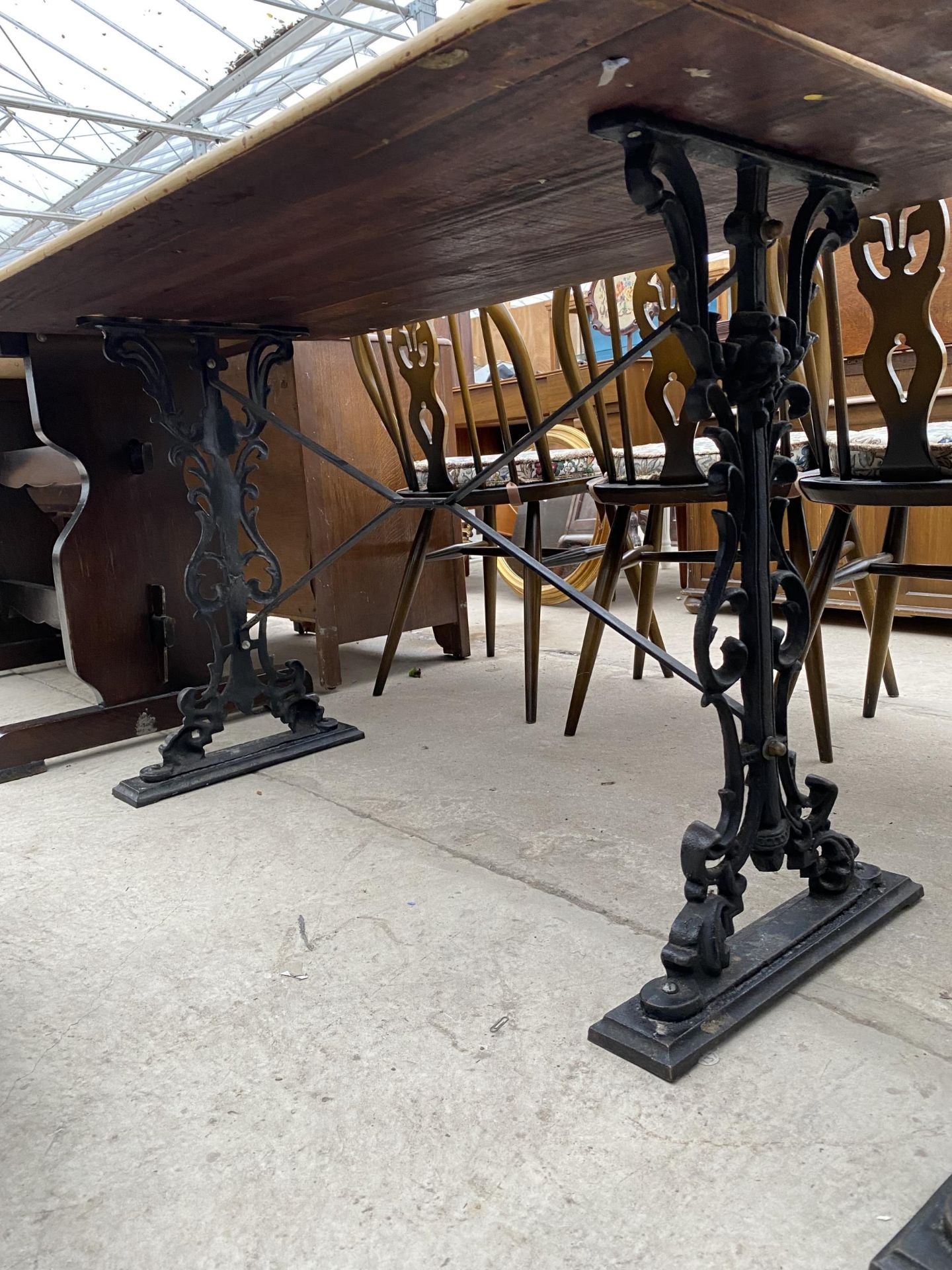 A PUB TABLE ON CAST IRON BASE, 48X27" - Image 2 of 3