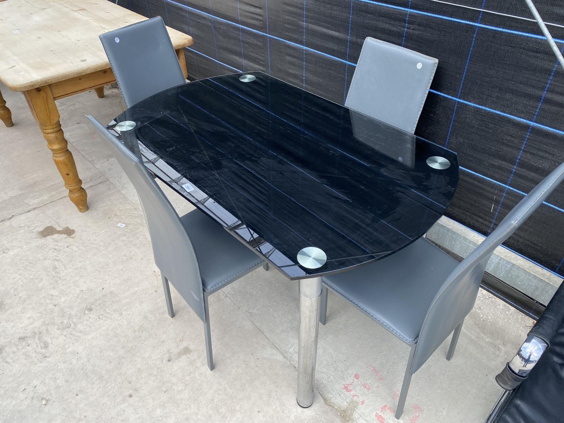 A MODERN GLASS TOP DINING TABLE AND FOUR CHAIRS WITH FOLDAWAY GLASS LEAVES - Image 2 of 7