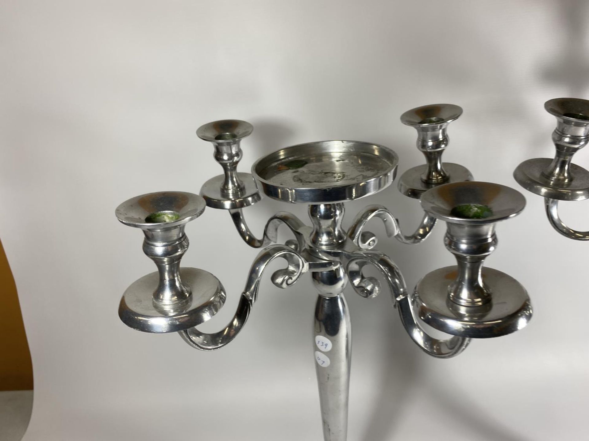 A LARGE PAIR OF CHROME FOUR BRANCH CANDLESTICKS WITH CENTRAL CIRCULAR SECTION - Image 2 of 3