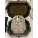 A BOXED BRASS SUNDIAL COMPASS BY COX OF LONDON