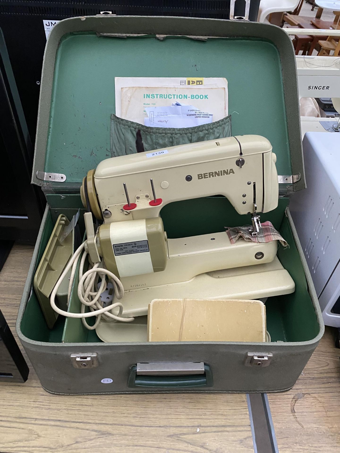 A RETRO BERNINA SEWING MACHINE WITH FOOT PEDAL