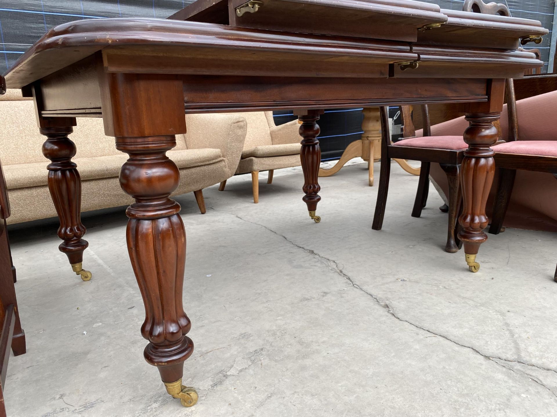A VICTORIAN STYLE MAHOGANY PULL-OUT DINING TABLE, 59X48" (TWO LEAVES 19" EACH) - Image 3 of 3
