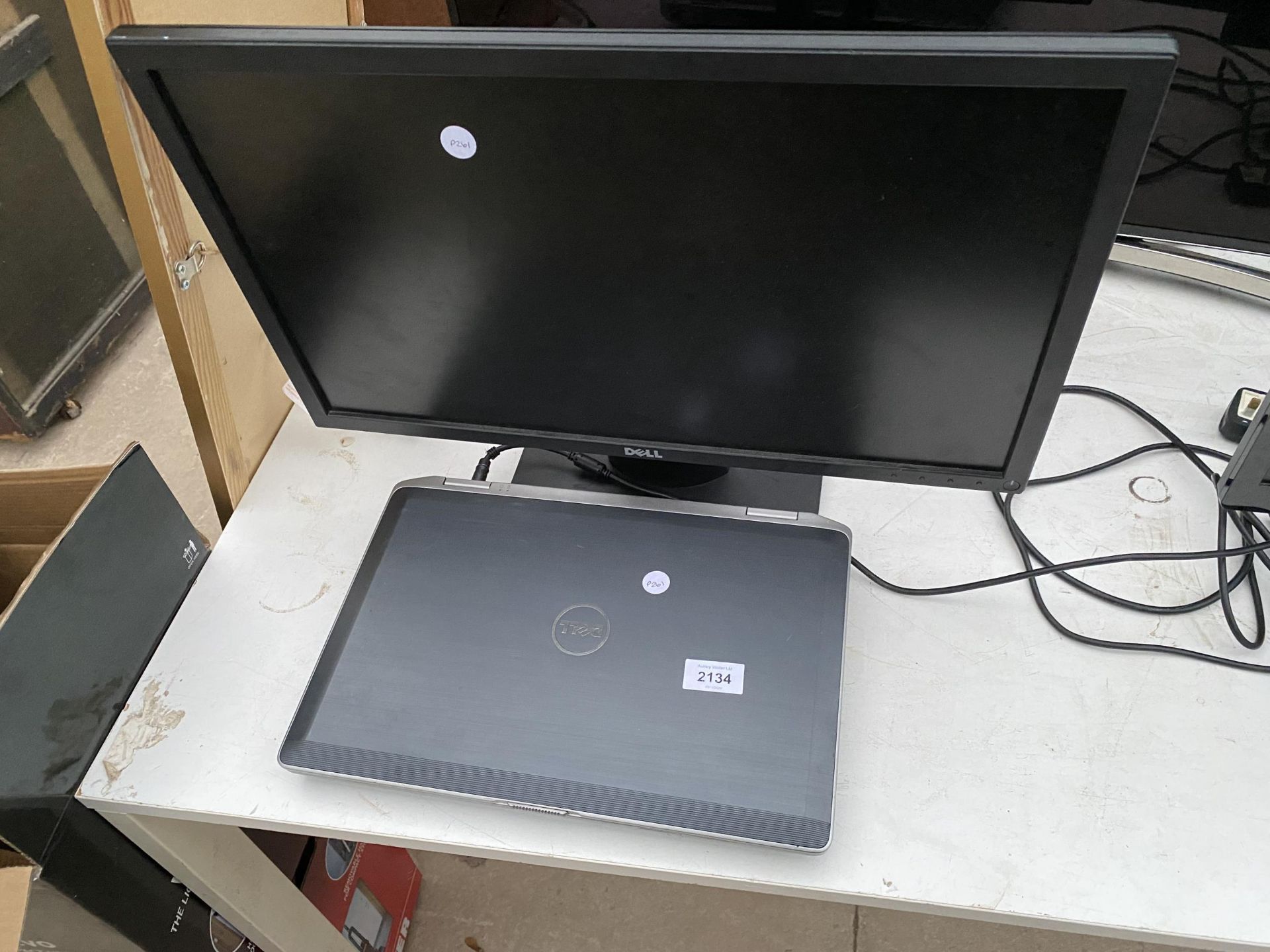 A DELL LAPTOP AND A DELL COMPUTER MONITOR