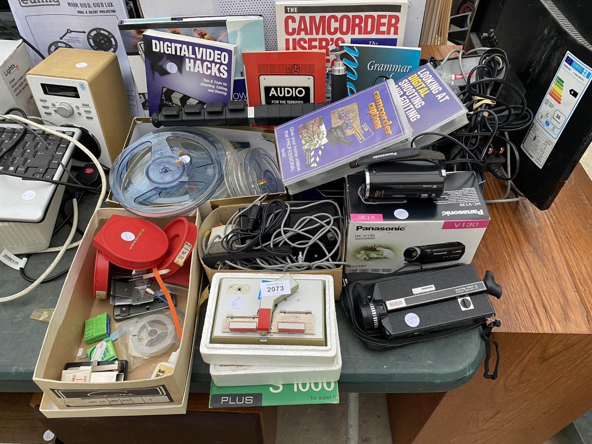 A LARGE ASSORTMENT OF ITEMS TO INCLUDE A PANASONIC CAMCORDER, A EUMIG MINI 3 CAMERA AND EMPTY FILM