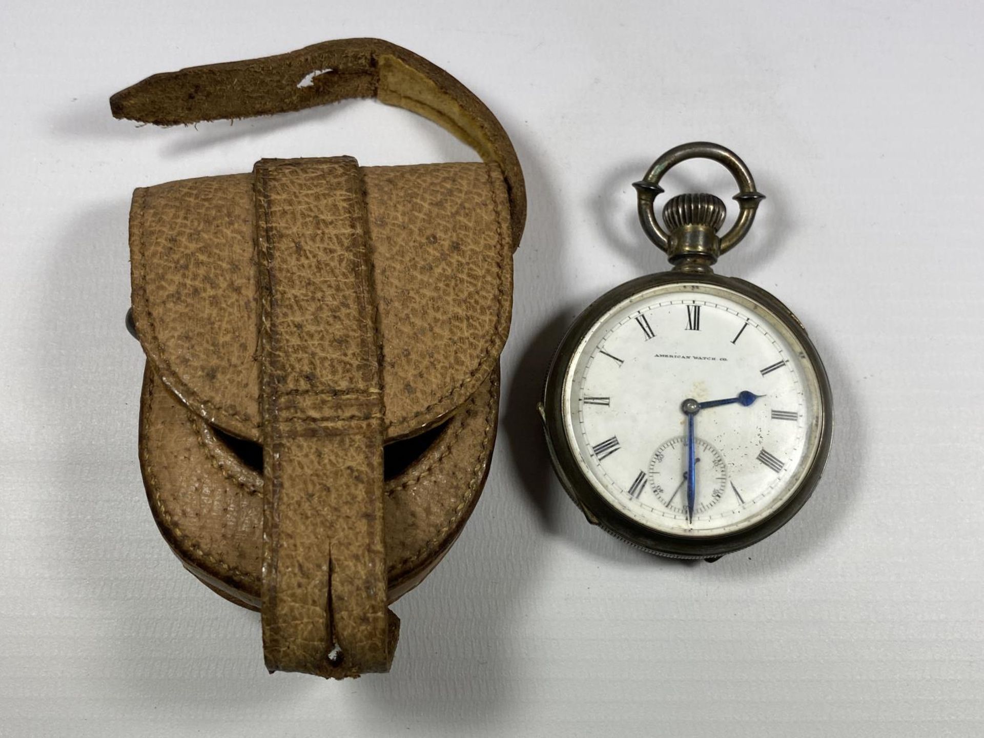 AN AMERICAN WATCH CO. WALTHAM MASS OPEN FACED CROWN WIND POCKET WATCH IN LEATHER POUCH
