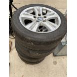 A SET OF FOUR BMW RIMS WITH 205/55R16 TYRES