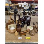 A COLLECTION OF TREEN ITEMS TO INCLUDE CANDLESTICKS, ELEPHANT AND BABY, VINTAGE CHURCH MONEY BOX,