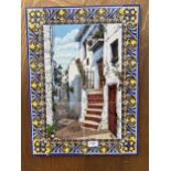 A VINTAGE CERAMIC TILED STREET SCENE WALL PLAQUE