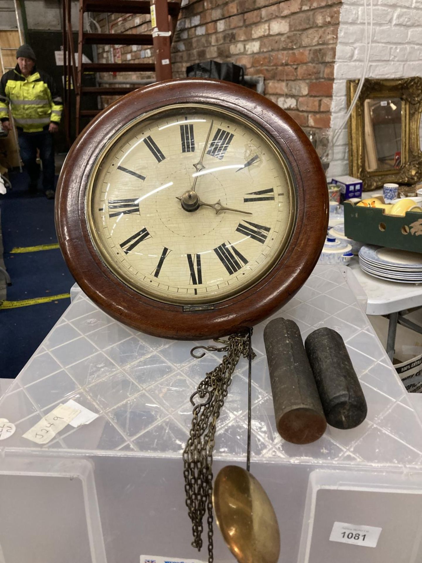 A POSTMAN'S CLOCK WITH PENDULUM AND WEIGHTS