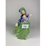 A ROYAL DOULTON 'AUTUMN BREEZES' HN1913 GREEN COLOURWAY LADY FIGURE