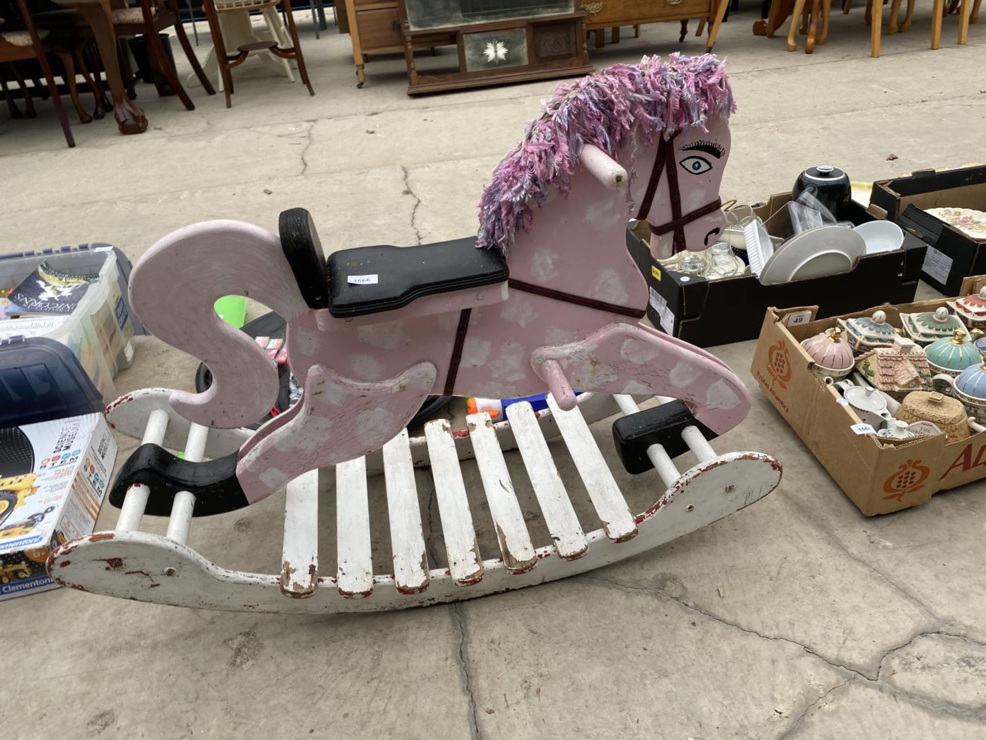 A VINTAGE CHILDRENS ROCKING HORSE