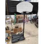 A CHILDS FREE STANDING BASKETBALL HOOP