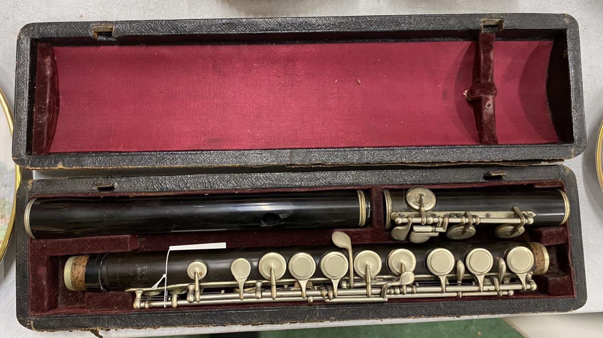 A VINTAGE CASED A.H LANGLOIS, LONDON CLARINET