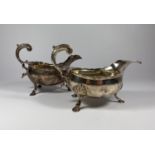 A PAIR OF GEORGE III HALLMARKED SILVER SAUCE / GRAVY BOATS, POSSIBLY BY GEORGE SMITH II, DATES TO
