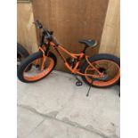 AN AS NEW ORANGE FOREKNOW SNOW BIKE WITH FRONT AND REAR SUSPENSION AND 24 SPEED SHIMANO GEAR SYSTEM