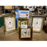 A QUANTITY OF CLOCKS TO INCLUDE THREE CARRIAGE CLOCKS, A BEDSIDE CLOCK AND AN OMRON DIGITAL BLOOD