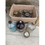 THREE LARGE GLASS MEDICINE BOTTLES AND AN ASSORTMENT OF GLASS JARS ETC