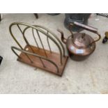A VINTAGE COPPER KETTLE AND A BRASS AND WOODEN MAGAZINE RACK