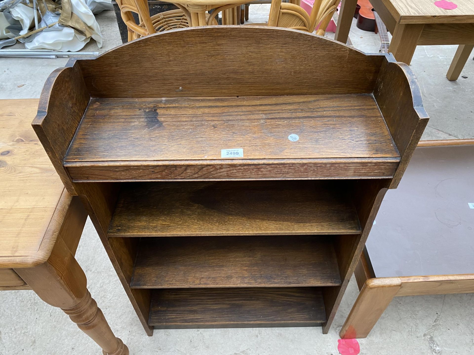 A MID 20TH CENTURY OAK THREE TIER OPEN BOOKCASE, 24" WIDE