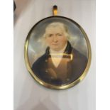 A FRAMED OVAL PORTRAIT PENDANT