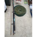 AN ASSORTMENT OF FISHING TACKLE TO INCLUDE RODS AND A LANDING NET ETC