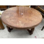 A MAHOGANY COFFEE TABLE ON TURNED LEGS WITH FLAT STRETCHERS, 35" DIAMETER
