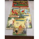 FIVE RUPERT ANNUALS - 1971, 1972, 1973, 1975 AND 1976 PLUS A COMICAL CLOWNS SHOOTING GAME