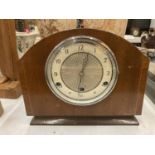 A VINTAGE MAHOGANY CASED BENTIMA MANTLE CLOCK COMPLETE WITH PENDULUM AND KEY