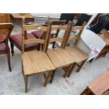 A LLOYD LOOM STYLE COMMODE CHAIR AND THREE MODERN PINE DINING CHAIRS