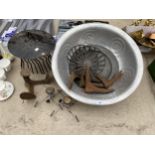 AN ASSORTMENT OF ITEMS TO INCLUDE COBBLERS LASTS, A METAL CHIMNEY POT GUARD AND A LARGE METAL BOWL