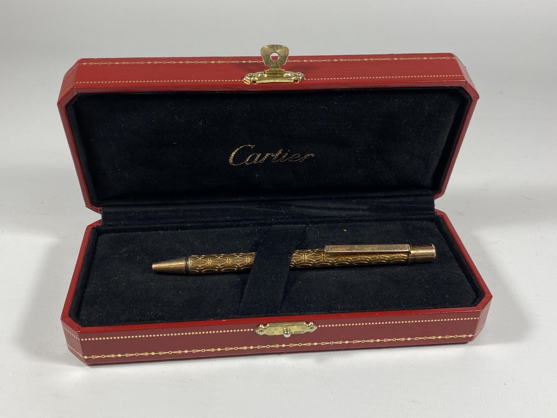 A BOXED CARTIER SANTOS PEN