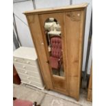 AN EARLY 20TH CENTURY PINE MIRROR-DOOR WARDROBE, 35" WIDE