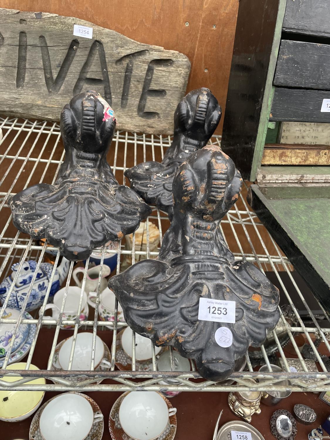 THREE VINTAGE CAST IRON BALL AND CLAW CAST IRON BATH FEET