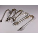FIVE ASSORTED HALLMARKED SILVER SUGAR TONGS