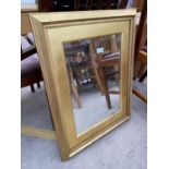 A MODERN GILT FRAMED WALL MIRROR, 28X22"