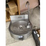 A STAINLESS STEEL ACORN THORN HAND WASHING SINK