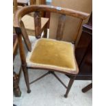 AN EDWARDIAN BEECH CORNER CHAIR