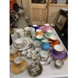 A LARGE QUANTITY OF ITEMS TO INCLUDE CUPS, SAUCERS, PLATES, EGG CUPS, CLARET JUG, CANDLE HOLDER, ETC