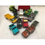 A BRITAINS TRAILER, DIE-CAST VEHICLES TO INCLUDE LAND ROVERS, VANS, TRACTOR, PLUS A JOHN DEERE TIN