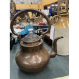A VINTAGE COPPER KETTLE WITH CERAMIC FINIAL