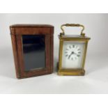 A 19TH CENTURY BRASS CASED, PROBABLY FRENCH, CARRIAGE CLOCK IN ORIGINAL LEATHER CASE, HEIGHT 14CM